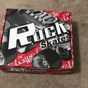 Black roller skates, size 11, has been worn twice at roller rink looks new